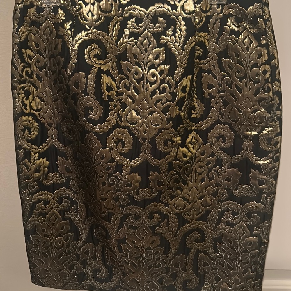 Gold and  black skirt